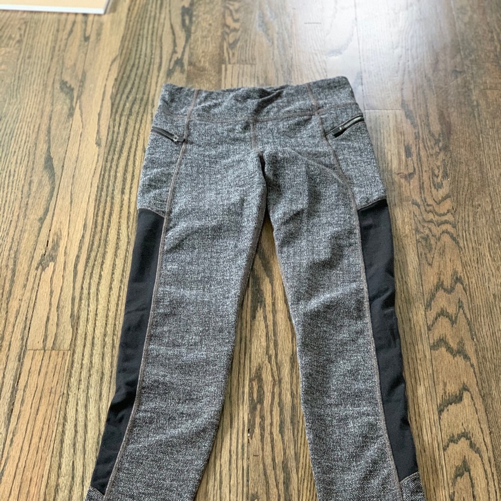 Athleta Girl (10-12) Black/Grey with side zippers.